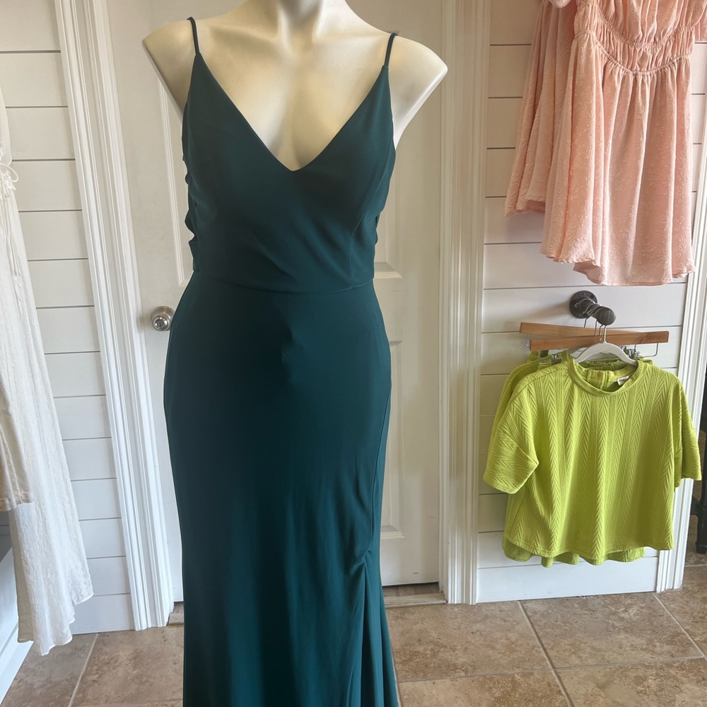 Formal size 7/8 dark teal dress. Super cute ! Worn once